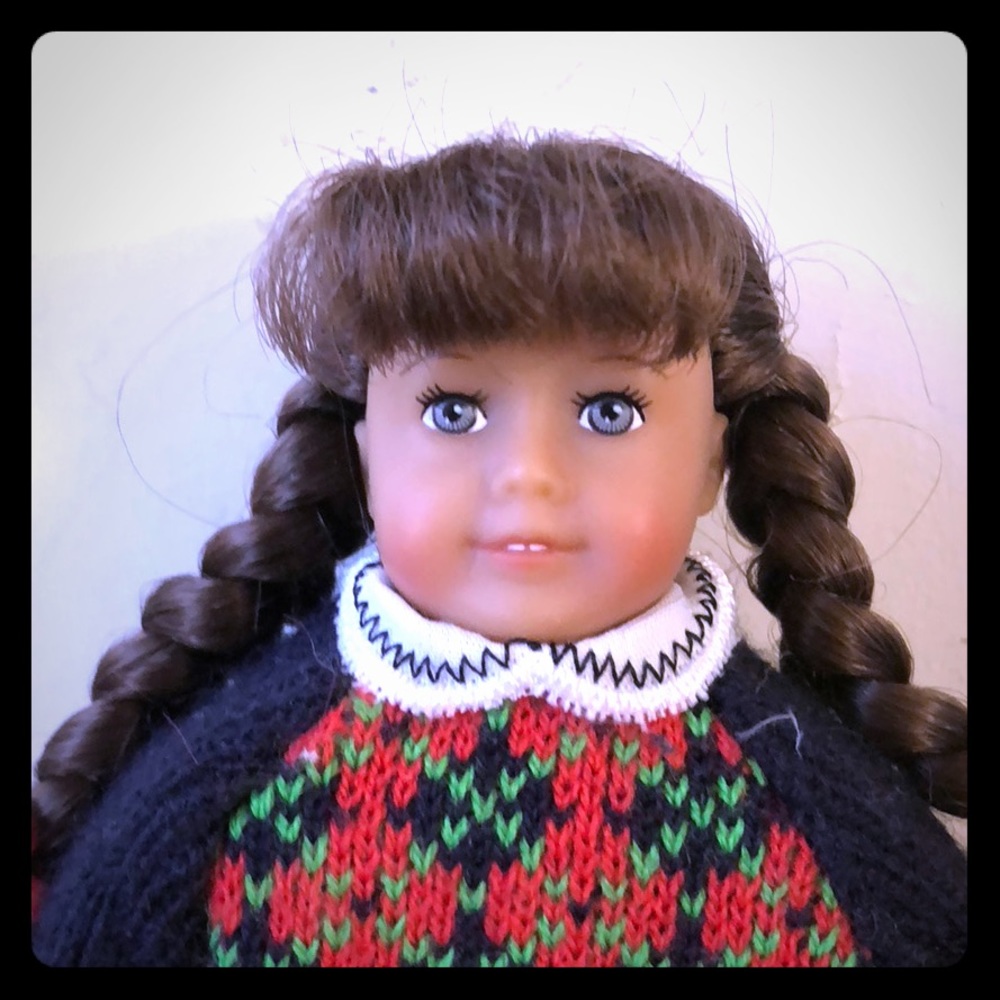 A mini 6.5 inch American girl doll (Molly).